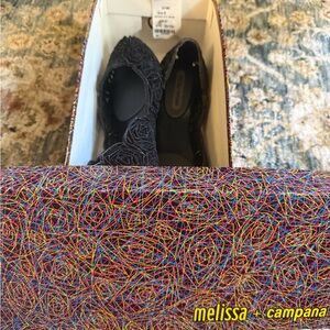 Melissa + campana Black Sparkle Jelly Flats with Textured Rosette Design